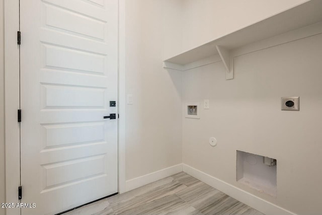 laundry room with gas dryer hookup, washer hookup, and electric dryer hookup