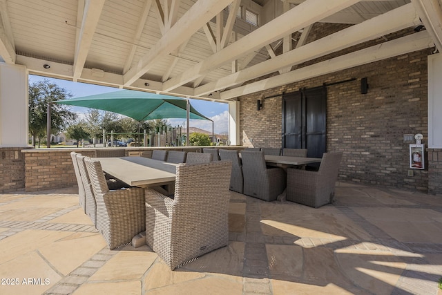 view of patio / terrace featuring an outdoor bar