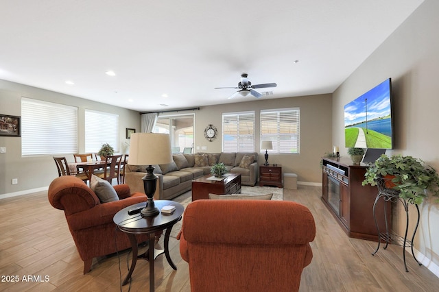 3359 E Penedes Dr, Gilbert, AZ 85298 - living area with baseboards, light wood-type flooring, a ceiling fan, and recessed lighting