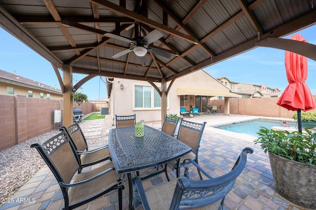 3359 E Penedes Dr, Gilbert, AZ 85298 - view of patio / terrace with a gazebo, outdoor dining area, ceiling fan, and a fenced backyard