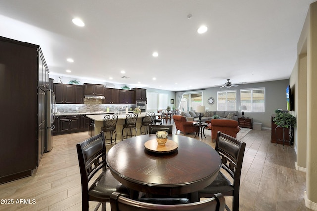 3359 E Penedes Dr, Gilbert, AZ 85298 - dining area featuring recessed lighting, a ceiling fan, baseboards, and light wood-type flooring