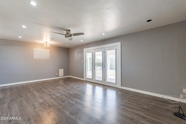 empty room with ceiling fan, dark wood-type flooring, recessed lighting, and baseboards