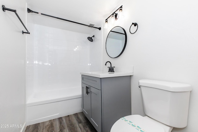 425 Paseo Redondo Unit 6L, Tucson, AZ 85701 - full bath featuring vanity, bathing tub / shower combination, and wood finished floors