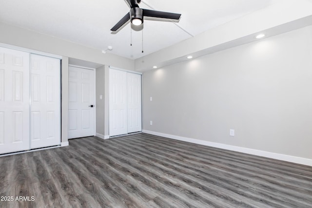 425 Paseo Redondo Unit 6L, Tucson, AZ 85701 - unfurnished bedroom featuring multiple closets, wood finished floors, recessed lighting, and ceiling fan