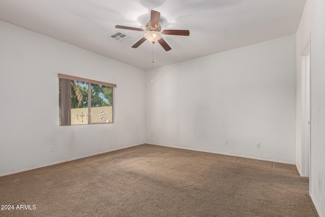 carpeted empty room with ceiling fan