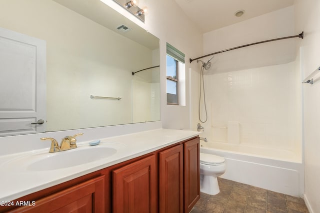 full bathroom with vanity, bathing tub / shower combination, and toilet