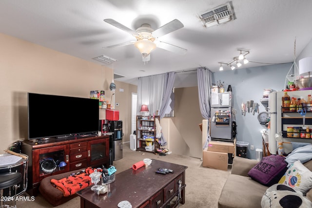 living room with light carpet and ceiling fan