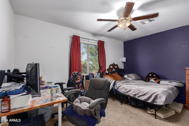 bedroom featuring light colored carpet and ceiling fan