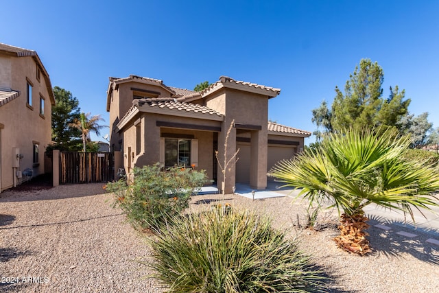 view of front of property with a garage