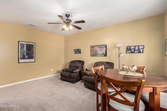 4125 W Lydia Ln, Phoenix, AZ 85041 - dining area with baseboards, ceiling fan, visible vents, and carpet