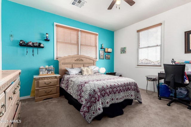 4125 W Lydia Ln, Phoenix, AZ 85041 - carpeted bedroom featuring baseboards, ceiling fan, and visible vents