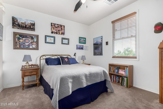 4125 W Lydia Ln, Phoenix, AZ 85041 - bedroom with carpet floors, baseboards, ceiling fan, and visible vents