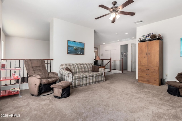 4125 W Lydia Ln, Phoenix, AZ 85041 - living room with visible vents, carpet flooring, and a ceiling fan