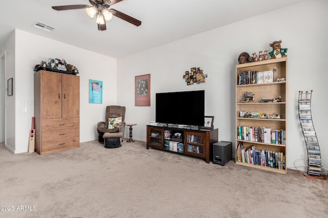 4125 W Lydia Ln, Phoenix, AZ 85041 - living room with a ceiling fan, visible vents, and carpet