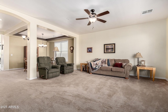 4125 W Lydia Ln, Phoenix, AZ 85041 - carpeted living area with baseboards, arched walkways, visible vents, and ceiling fan with notable chandelier