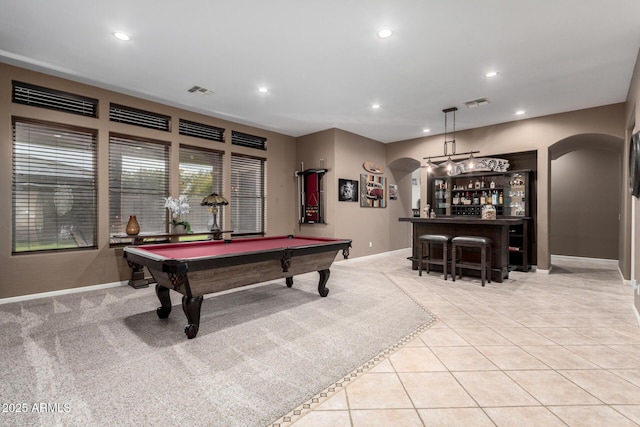 recreation room with bar area, billiards, and light tile patterned flooring