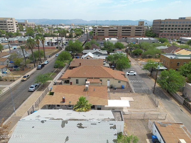 birds eye view of property featuring a mountain view