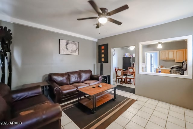 living room featuring ceiling fan and light tile patterned flooring