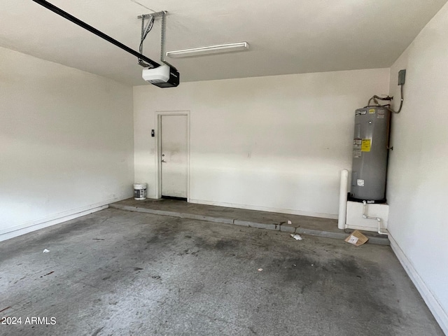 garage with electric water heater and a garage door opener