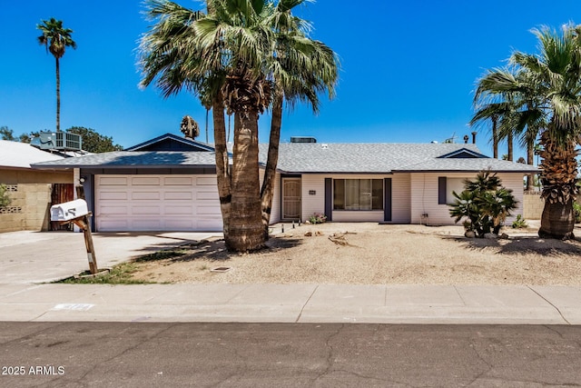 4702 W Northview Ave, Glendale, AZ 85301 - single story home with driveway, an attached garage, roof with shingles, and central air condition unit