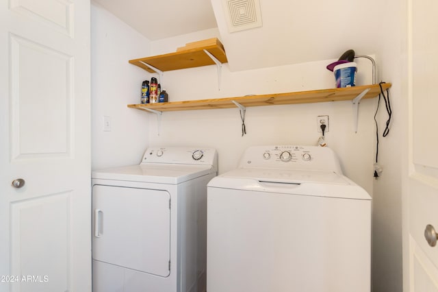 laundry area featuring independent washer and dryer