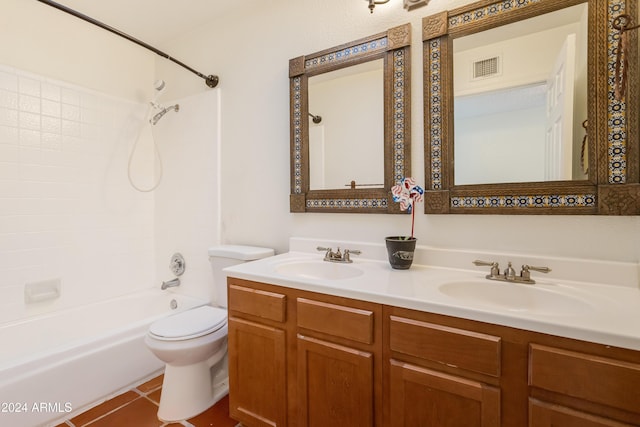 full bathroom with tile patterned flooring, vanity, shower / bath combination, and toilet