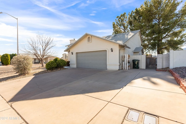 view of side of property featuring a garage