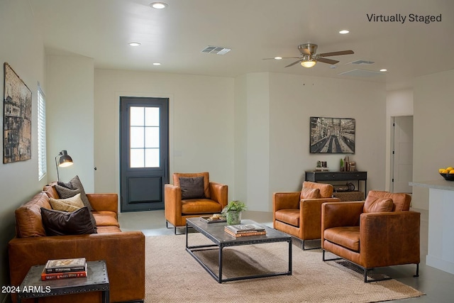 living room featuring ceiling fan