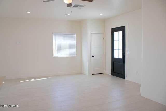 foyer with ceiling fan