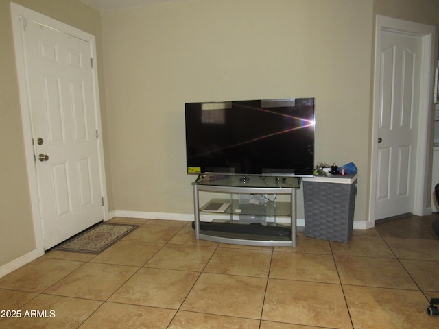 interior space featuring baseboards