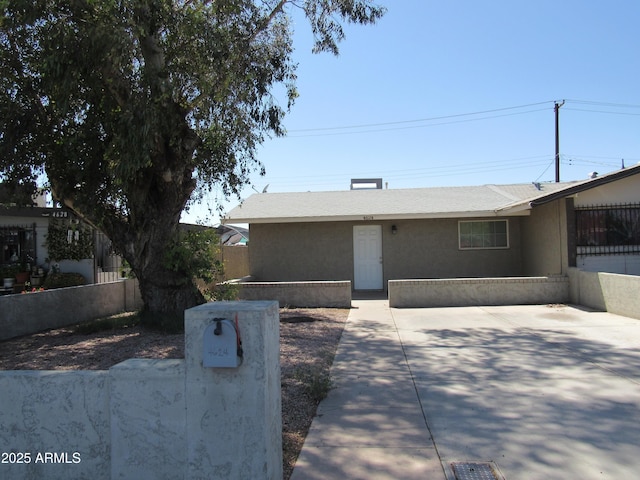 ranch-style home with fence private yard, a patio area, and stucco siding