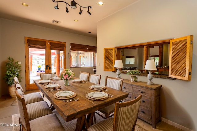 tiled dining space with french doors