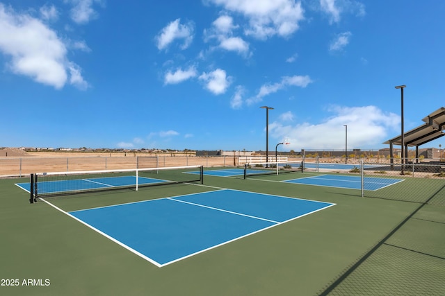 view of sport court with community basketball court and fence