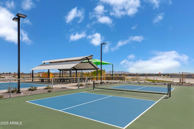 view of sport court featuring community basketball court, a gazebo, and fence