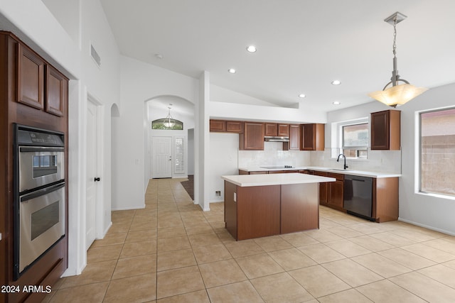 kitchen featuring sink, tasteful backsplash, lofted ceiling, a kitchen island, and black appliances