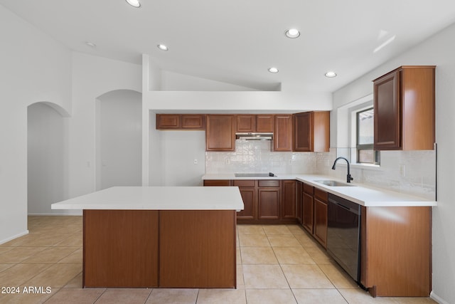 kitchen featuring sink, light tile patterned floors, backsplash, a kitchen island, and black appliances