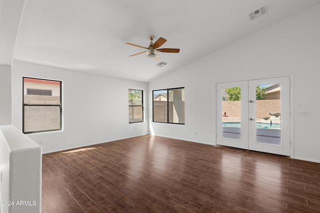 unfurnished room with ceiling fan, french doors, dark wood-type flooring, and lofted ceiling