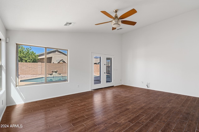 unfurnished room featuring ceiling fan and french doors