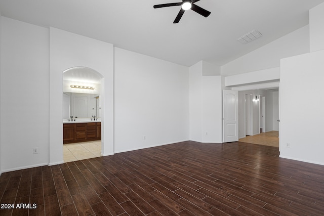 spare room featuring ceiling fan and lofted ceiling