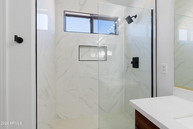 bathroom featuring vanity and walk in shower