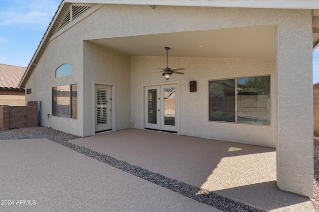 view of patio featuring ceiling fan and french doors