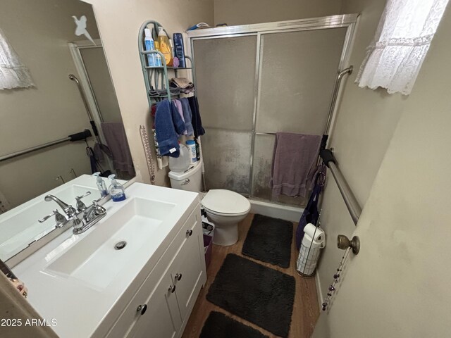10833 N 43rd Dr, Glendale, AZ 85304 - full bath with a shower with shower door, vanity, and toilet