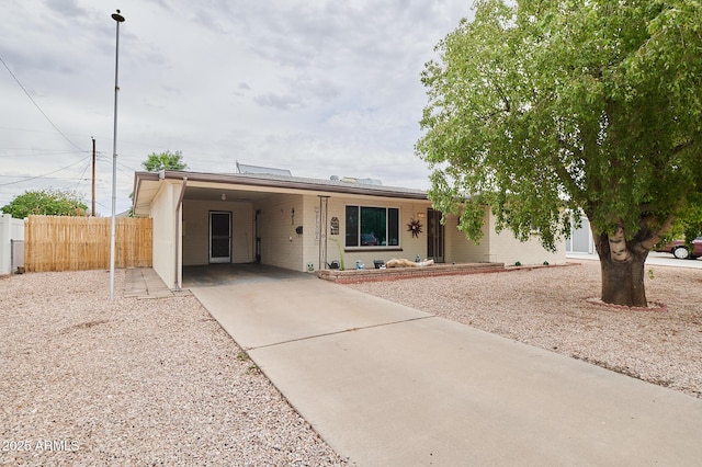 5410 E University Dr, Mesa, AZ 85205 - single story home with concrete driveway and a carport