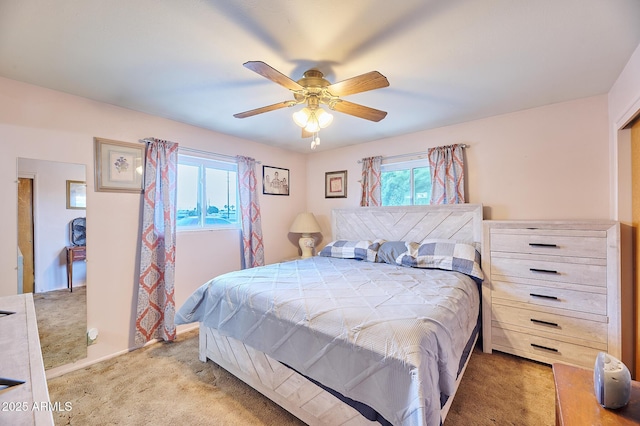 5410 E University Dr, Mesa, AZ 85205 - bedroom featuring light carpet and ceiling fan