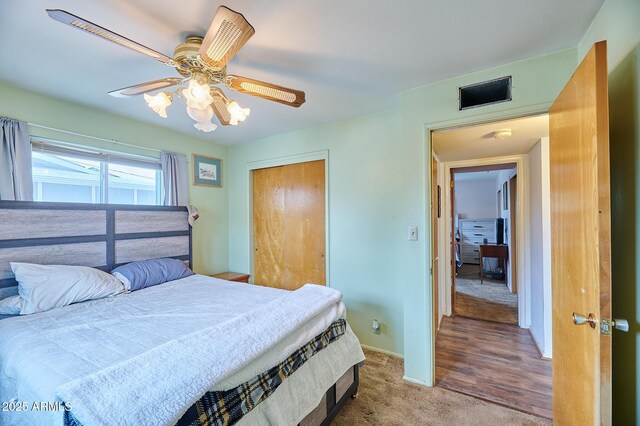 5410 E University Dr, Mesa, AZ 85205 - carpeted bedroom featuring a closet, ceiling fan, and baseboards
