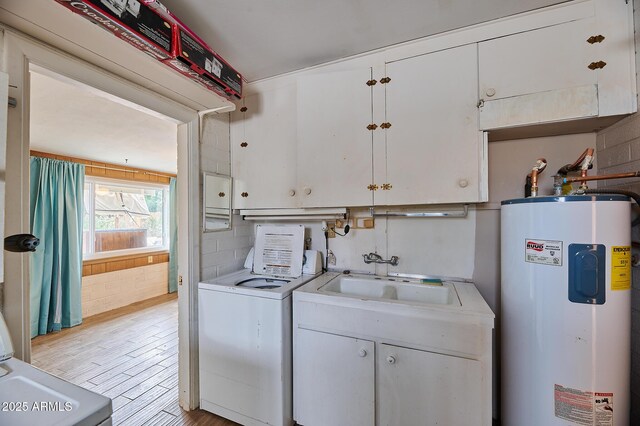 5410 E University Dr, Mesa, AZ 85205 - laundry area with electric water heater, separate washer and dryer, cabinet space, and light wood-style flooring