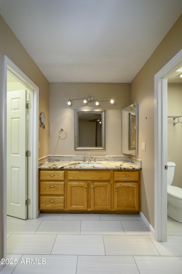 8230 E Navarro Ave, Mesa, AZ 85209 - full bath with vanity, toilet, and tile patterned floors