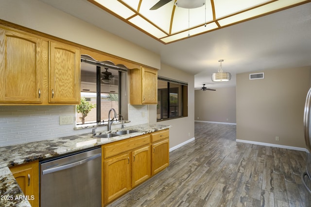 8230 E Navarro Ave, Mesa, AZ 85209 - kitchen featuring ceiling fan, dishwasher, a sink, and backsplash