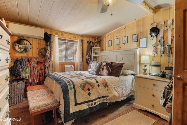 bedroom featuring ceiling fan, hardwood / wood-style flooring, wooden ceiling, a wall mounted air conditioner, and wood walls