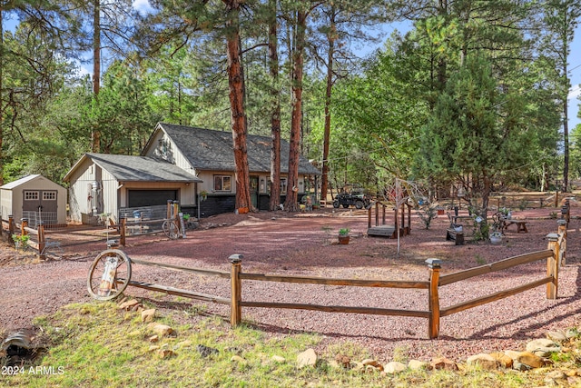 view of yard with a storage unit